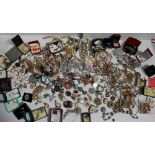 A large lot of costume jewellery including Lady's wristwatches, pendants, brooches, dress ring,