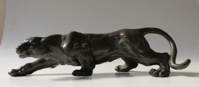 A 20th century Bronze model of a stalking Panther,