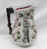 A 19th century pottery jug decorated with soldiers leaning on their rifles with a rifle handle, 19.