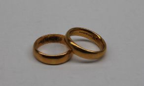 Two 22ct yellow gold wedding bands, approximately 20.