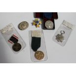 A Nazi World War II "Blood and Soil" Merit medal,