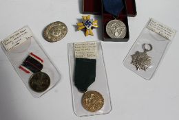 A Nazi World War II "Blood and Soil" Merit medal,