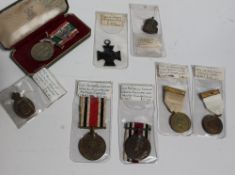 A British medal group comprising Special constabulary faithful service medals awarded to Henry