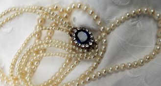 A three strand pearl necklet, of one hundred and three,