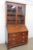 A George III mahogany bureau bookcase,