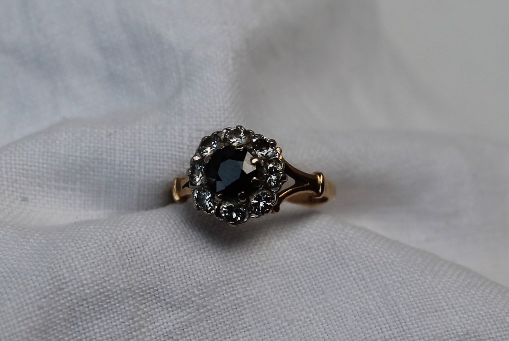 A sapphire and diamond cluster ring,