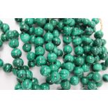 Two malachite bead necklaces and a matching bracelet