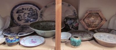 An 18th century Chinese porcelain polychrome decorated plate, together with a Celadon bowl,