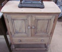 A 20th century Ercol side cabinet