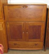 An Ercol teak bureau,