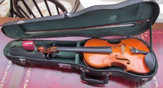 A Chinese violin and case