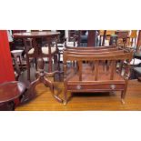 A pair of reproduction mahogany torcheres together with a wine table and a Canterbury