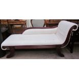 A Victorian style chaise longue with outswept legs