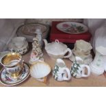 A Belleek part tea set together with collectors plates,