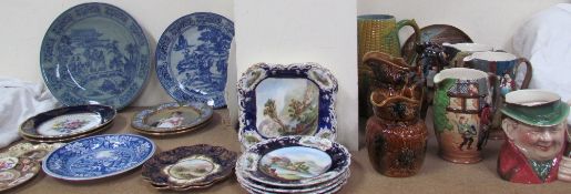 A collection of Royal Doulton jugs and Continental plates, together with Aynsley plates,