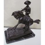 In the style of Frederick Remington A cowboy on horseback Bronze