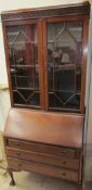 A 20th century mahogany bureau bookcase,