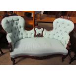 A Victorian rosewood upholstered double chair back settee