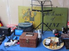 A sign for “The House of Line” together with a music stand, pottery charger, jewellery boxes,