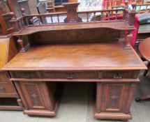 An Edwardian walnut pedestal desk,