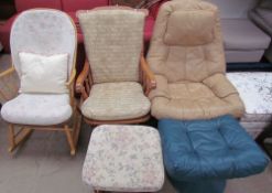 A brown leather chair together with two rocking chairs and three foot