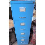 A blue painted four drawer filing cabinet