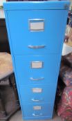 A blue painted four drawer filing cabinet