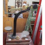 A scales with brass weights and a base drawer