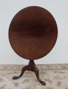 A George III mahogany tripod table,