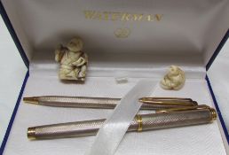 A white and yellow metal Waterman fountain pen, with matching rollerball, boxed,