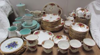 A Royal Albert Old Country Roses part tea and dinner set together with a Poole pottery part coffee