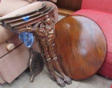 A pub table with a circular top,