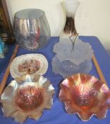 Two carnival glass pedestal bowls together with a glass cake stand,