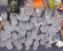 Crystal cut glass vases together with drinking glasses,