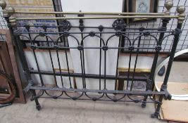 A brass and iron double bed, with arched supports, and side bars, head is 120cm high,