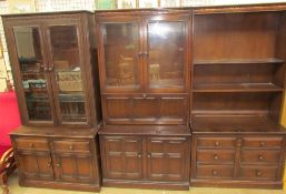 Three mid-20th century oak wall units,