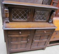 A 20th century oak court cupboard