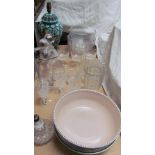 A Poole pottery bowl together with pottery table lamps, glass bowls, decanter,
