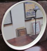 A mid 20th century circular wall mirror