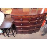 A 19th century mahogany bow front chest with two short and three long graduated drawers together