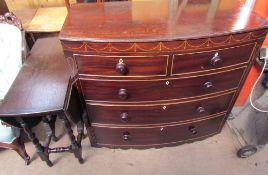 A 19th century mahogany bow front chest with two short and three long graduated drawers together