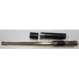 A brass three drawer telescope with leather covering,