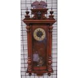 A walnut cased Vienna regulator type wall clock together with mouldings and a mantle clock