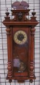 A walnut cased Vienna regulator type wall clock together with mouldings and a mantle clock