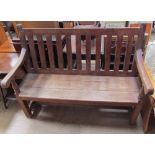 A teak garden bench