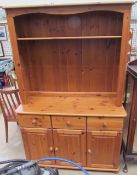 A 20th century pine dresser with three drawers and three cupboards