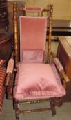 An American rocking chair with pad upholstered back,