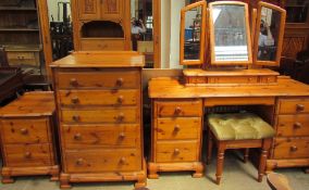 A pine dressing table together with a pine dressing table mirror,