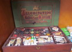 A Windsor and Newton artists box together with books on painting,