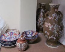 A Japanese Kutani vase and cover together with Japanese Imari plates,